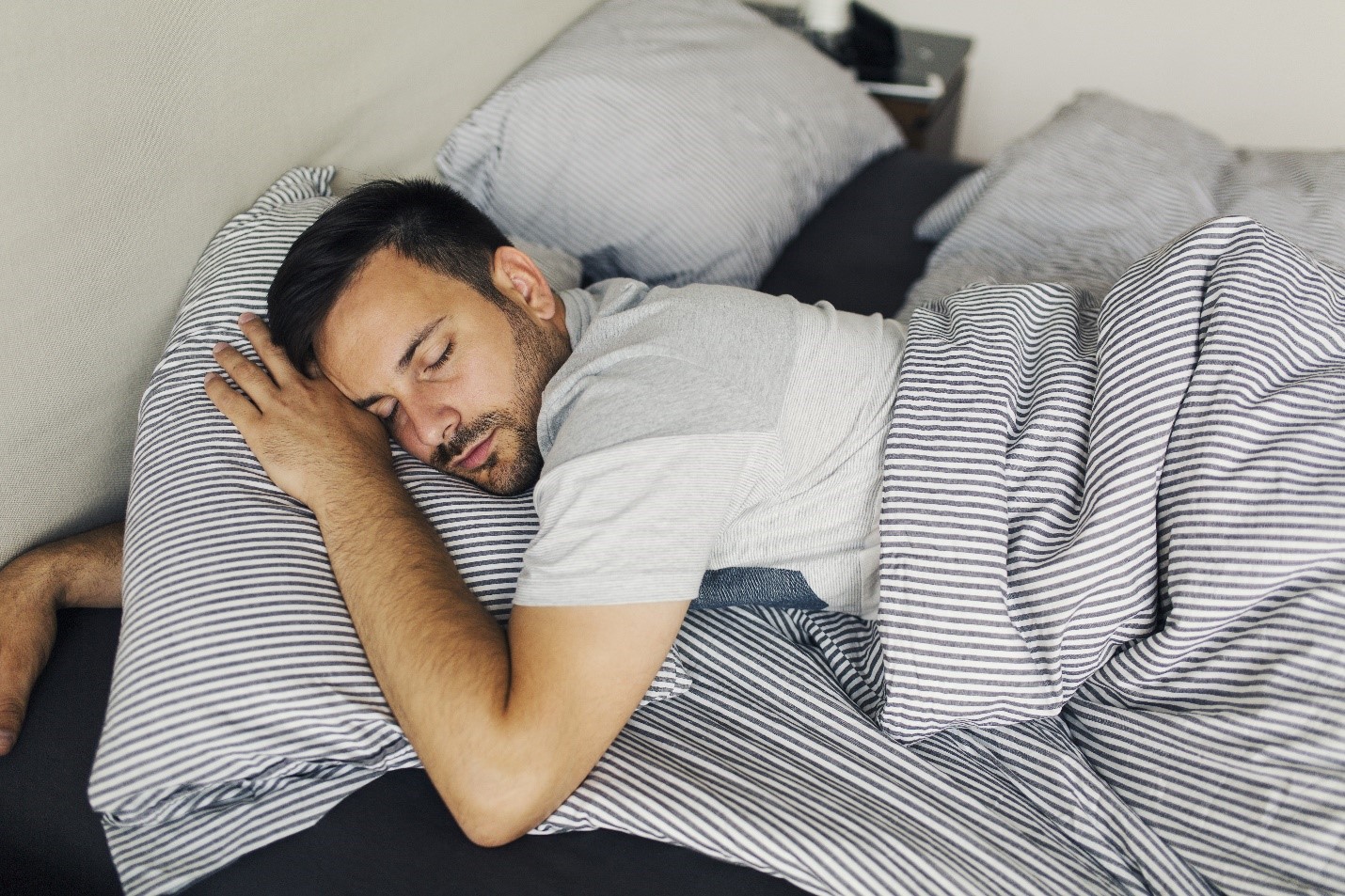 man-sleeping-alone